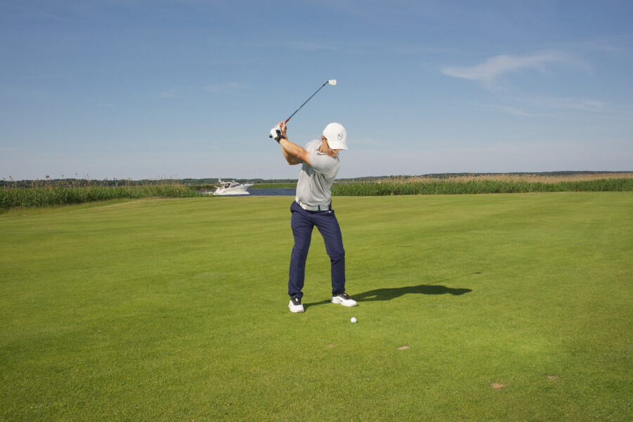 golfer swing hit with iron